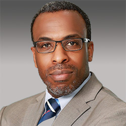 Corey E. Thomas headshot Corey E. Thomas headshot